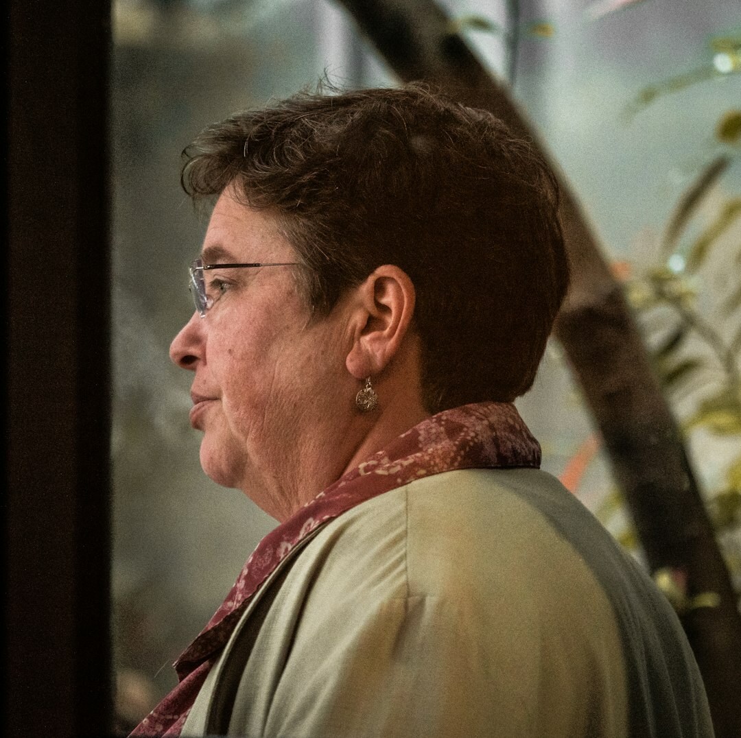 Portrait of a professional woman with short brown hair